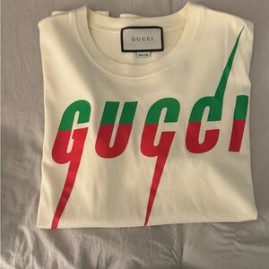 Gucci Ivory Tee with Vibrant Red and Green Design